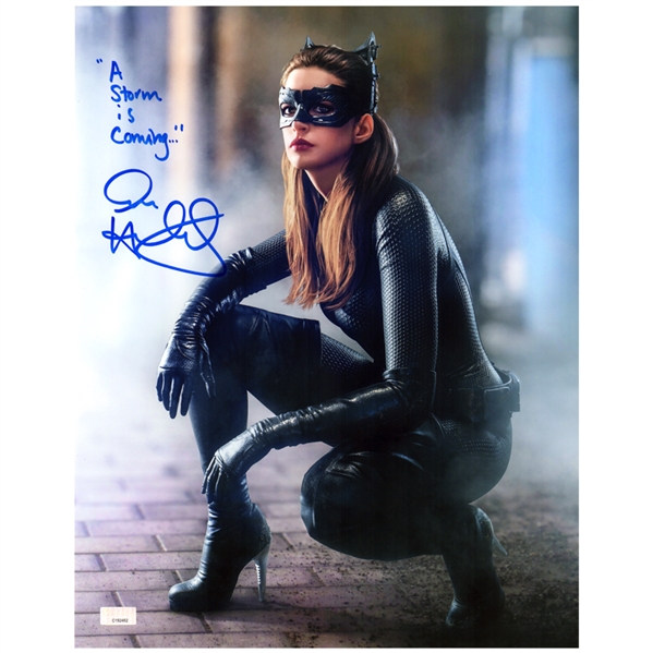 Anne Hathaway Autographed 2012 The Dark Knight Rises Catwoman 11x14 Photo with A Storm is Coming Inscription