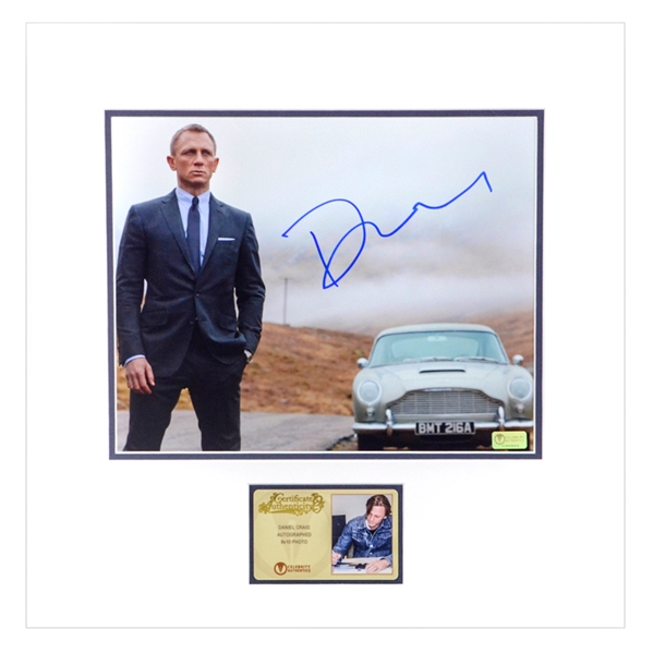 Daniel Craig Autographed Skyfall DB5 Drive 8x10 Matted Photo